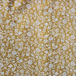 Gold and White Floral Patterned Fabric